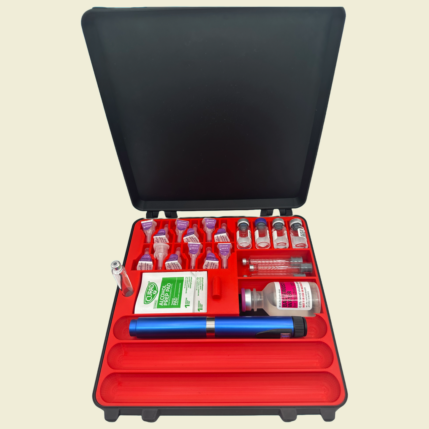 Open 3-pen peptide and GLP-1 storage case with red insert, holding 3 injection pens, alcohol pads, needles, vials, and wipes – ideal for organizing daily medication protocol