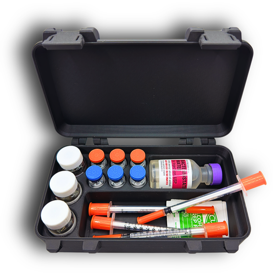 Open storage case fully loaded with three 10ml vials, six 3ml vials, a larger BAC water vial, syringes, and alcohol wipes. Compartments keep all items upright and separated for secure transport. Black snap-lock case ideal for TRT, HRT, GLP-1, insulin, and general wellness routines at home, in a gym bag, or during travel.