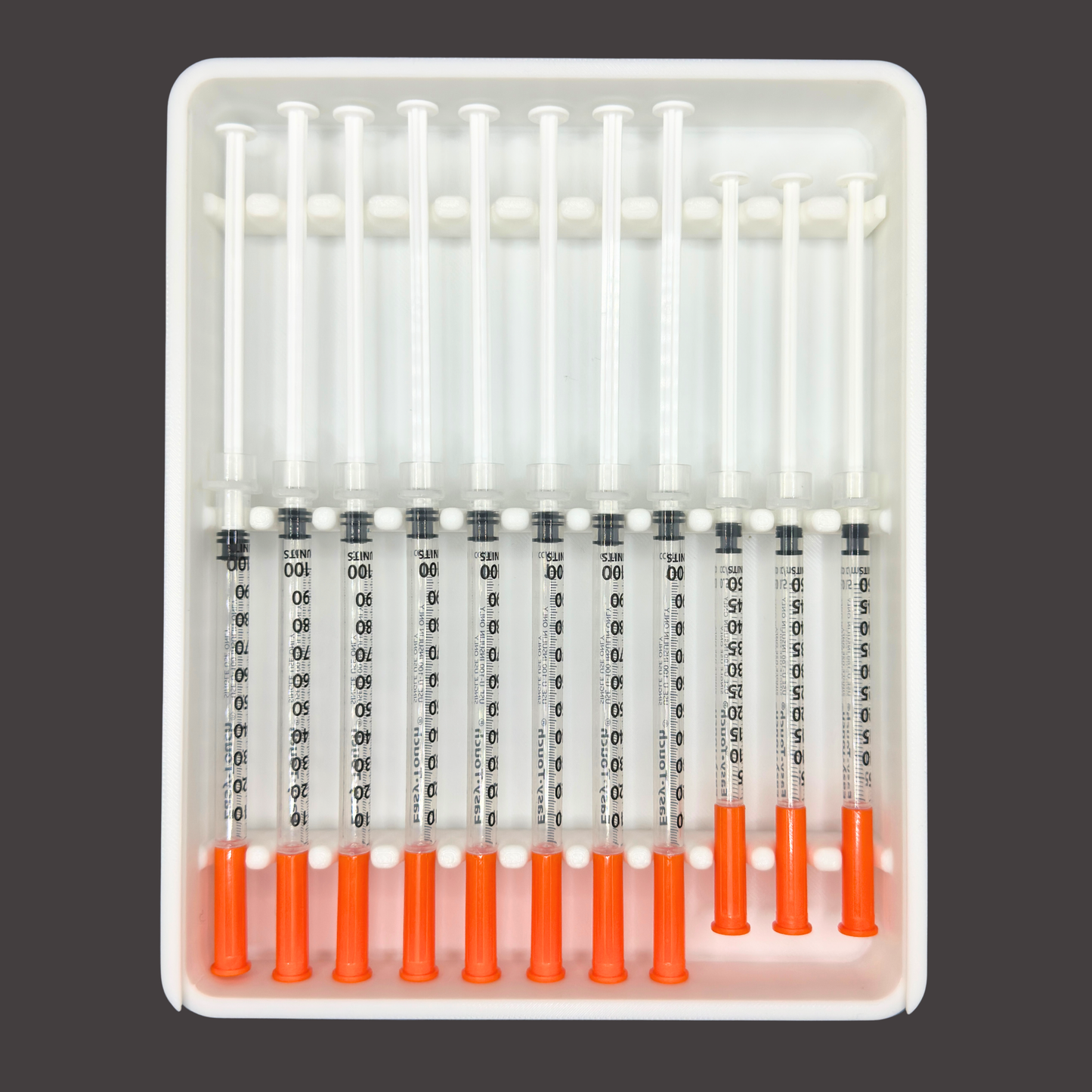 Top down interior view of 11 slot syringe storage case showing precision-fit channels for prefilled 1ml syringes. Individual slots keep syringes separated to reduce contact and movement during storage. Slim injection organizer designed for TRT, GLP-1, insulin, and wellness routines. Compact layout supports daily dosing, weekly preparation, and organized storage.
