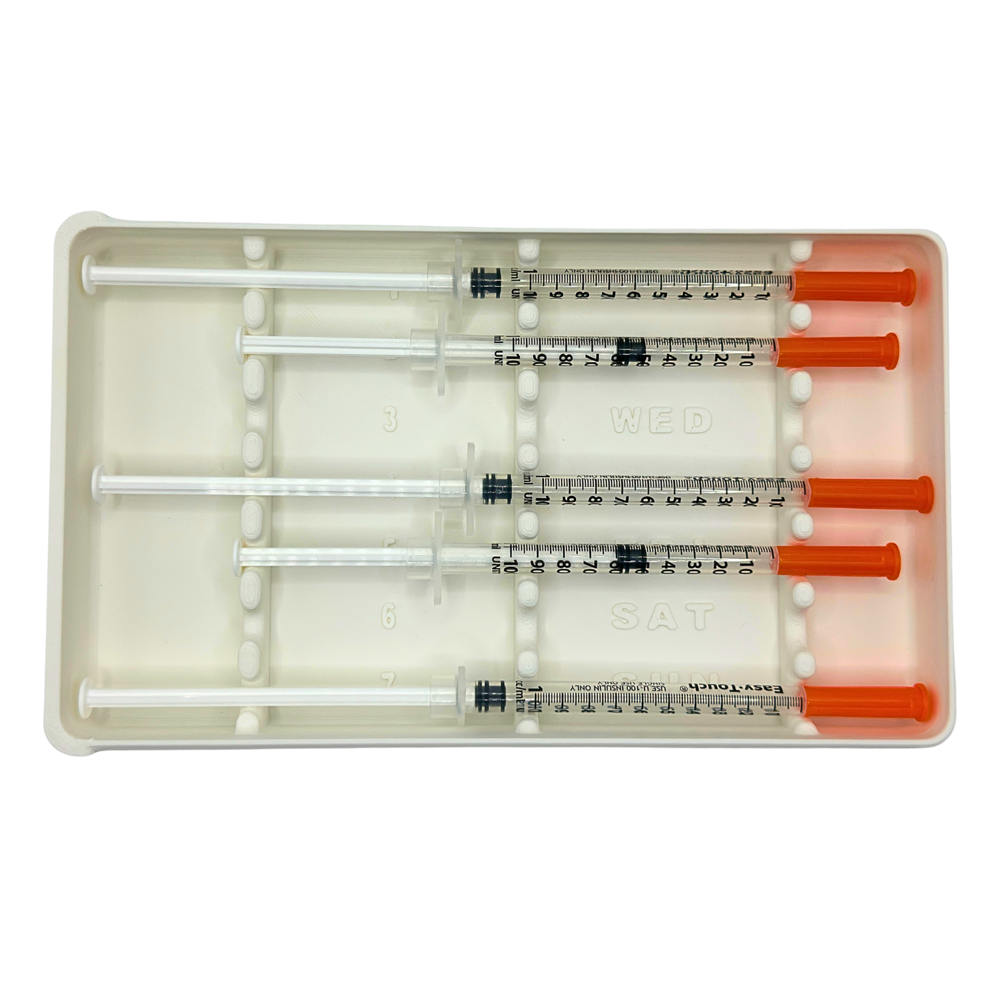 White 7-slot syringe organizer with 5 of 7 slots loaded, top-down view showing numbered slots and day-of-week labels including Wednesday and Saturday. Prefilled syringe holder keeps 1ml insulin syringes neatly separated. Weekly dose tracking case for daily routines, fridge storage, or travel.