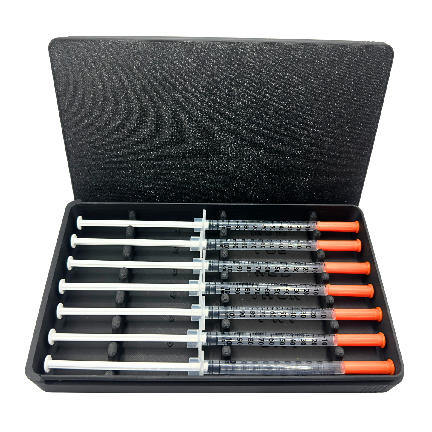 7-slot prefilled syringe case in black loaded with seven 1ml insulin syringes. Weekly organizer with numbered slots and day-of-week labels Monday through Sunday. Sliding lid syringe holder keeps prefilled doses separated and protected. Compact storage case for TRT, GLP-1, insulin daily dosing routines, fridge organization, or travel.