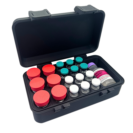 Open vial storage case at an angle holding six 10ml vials with red caps, twelve 3ml vials, and a 30ml bacteriostatic water bottle in precision-fit slots